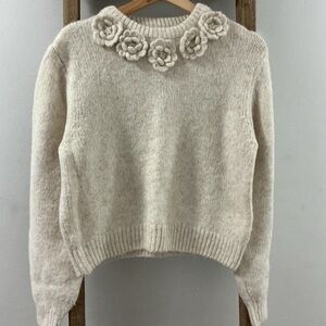 Elegant Cream Sweater with Floral Detailing